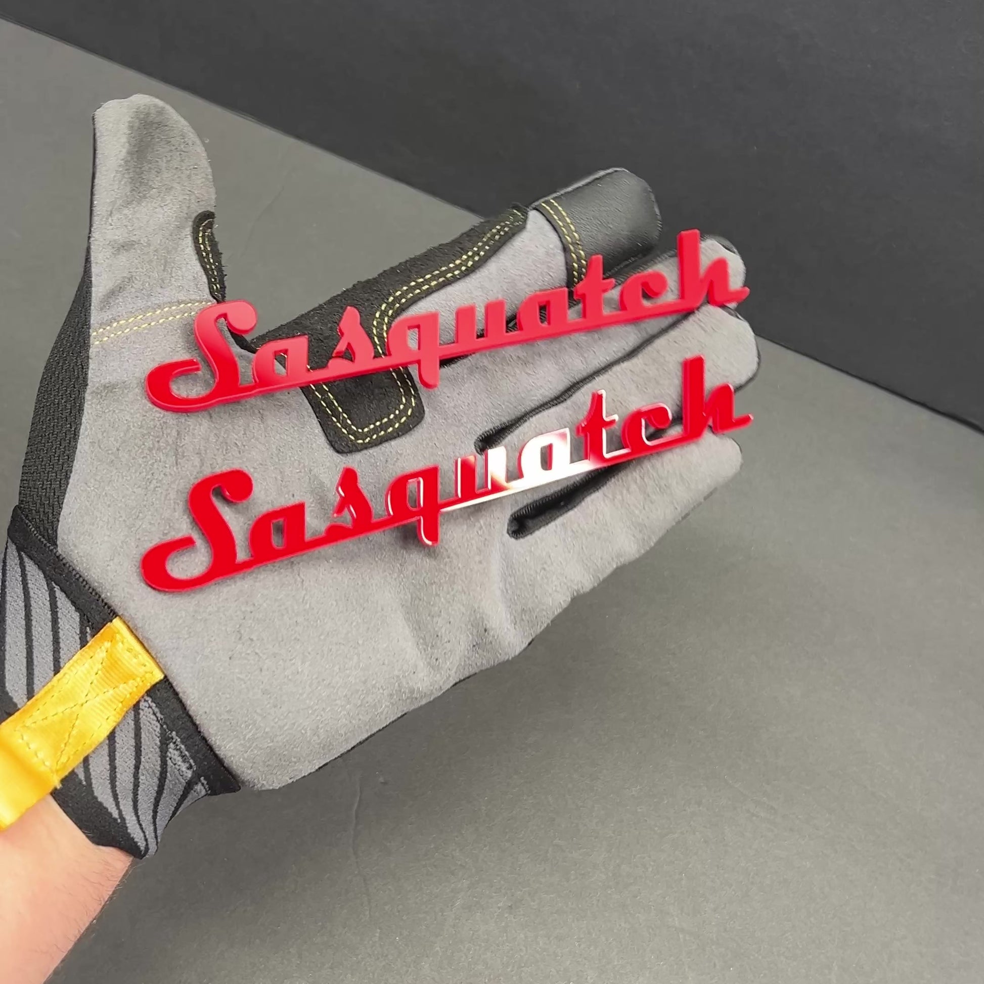 Custom automotive text emblem in layered acrylic black and white finish