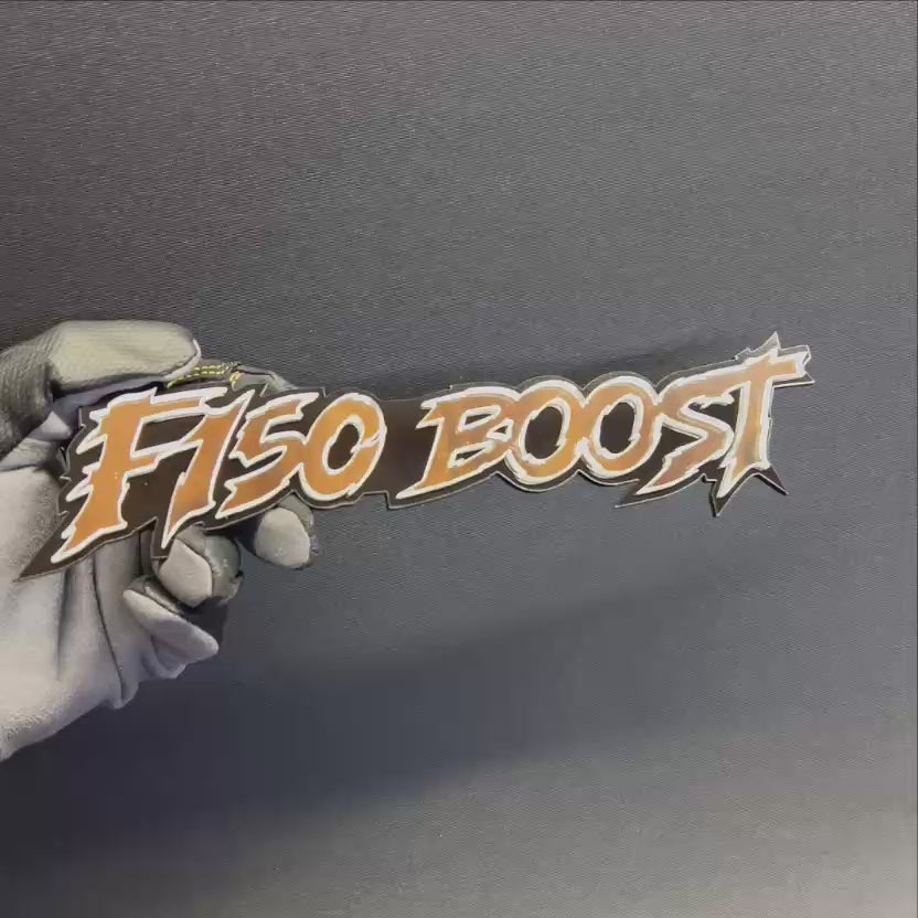 Custom F150 Boost truck emblem with black and bronze layered performance design.