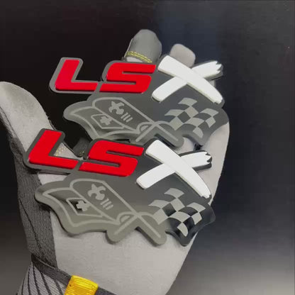 Red and white LSX crossed racing flags automotive fender emblem