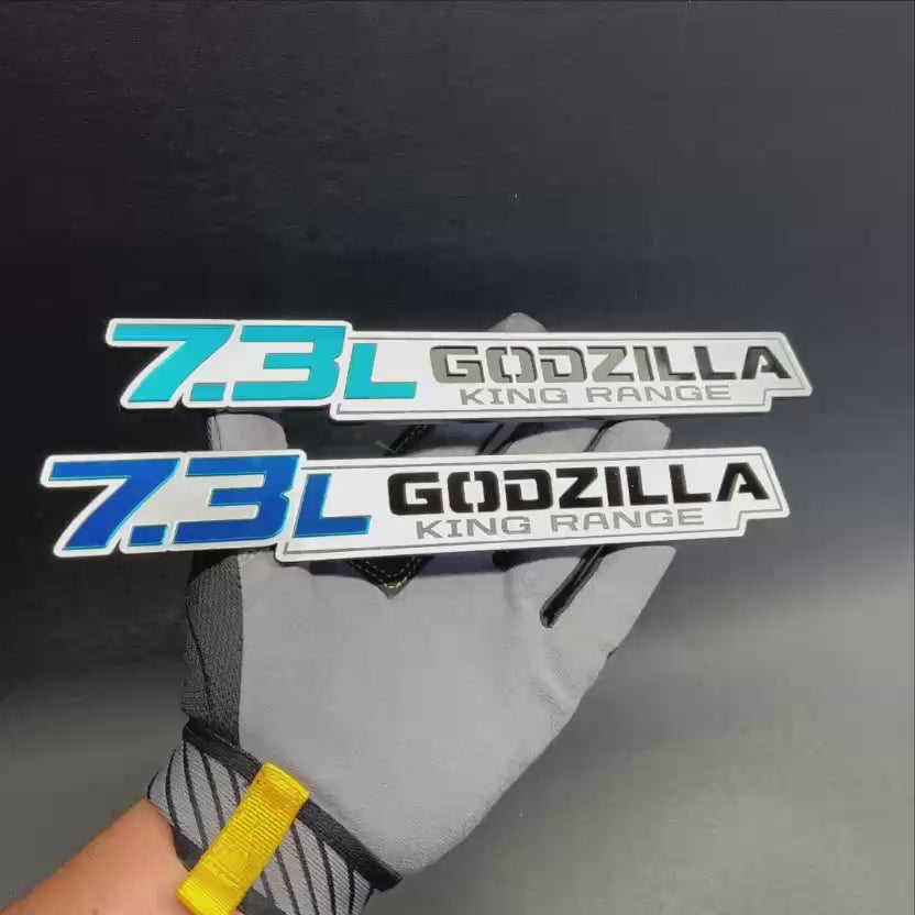 Custom 7.3L engine car badge with Godzilla King Range text for truck exterior