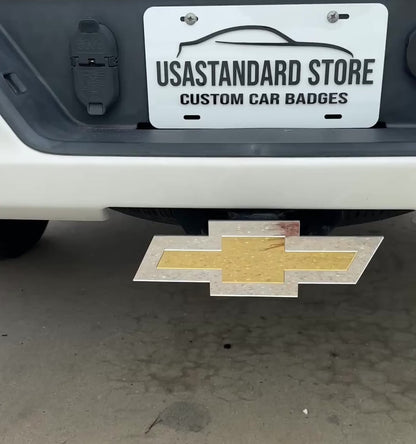 Chevrolet Bowtie hitch cover with gold center and silver outer finish