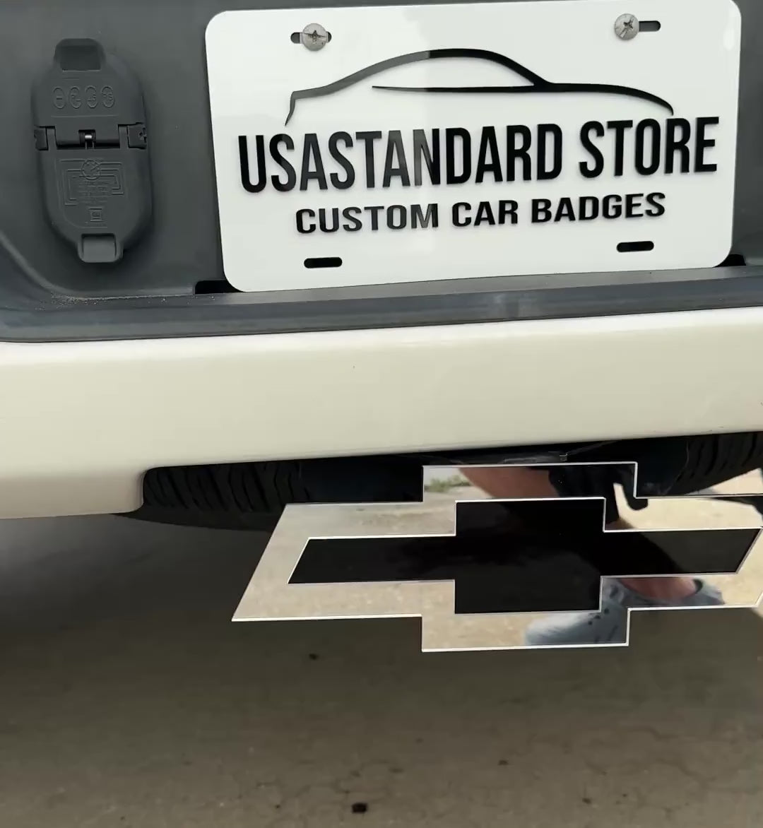 Chevrolet Bowtie hitch cover with mirror silver outer shape and black center