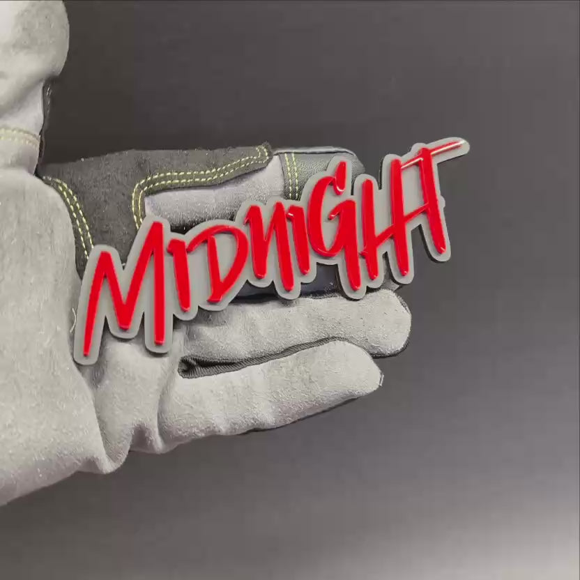 Personalized Midnight acrylic fender emblem with bold script lettering and 3M adhesive backing