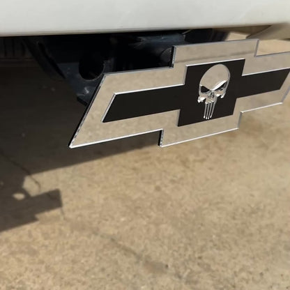 Chevrolet Bowtie hitch emblem with Punisher skull design in silver and blac