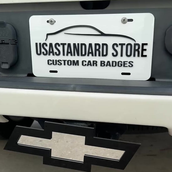 Chevrolet Bowtie hitch cover with mirror silver center and glossy black border