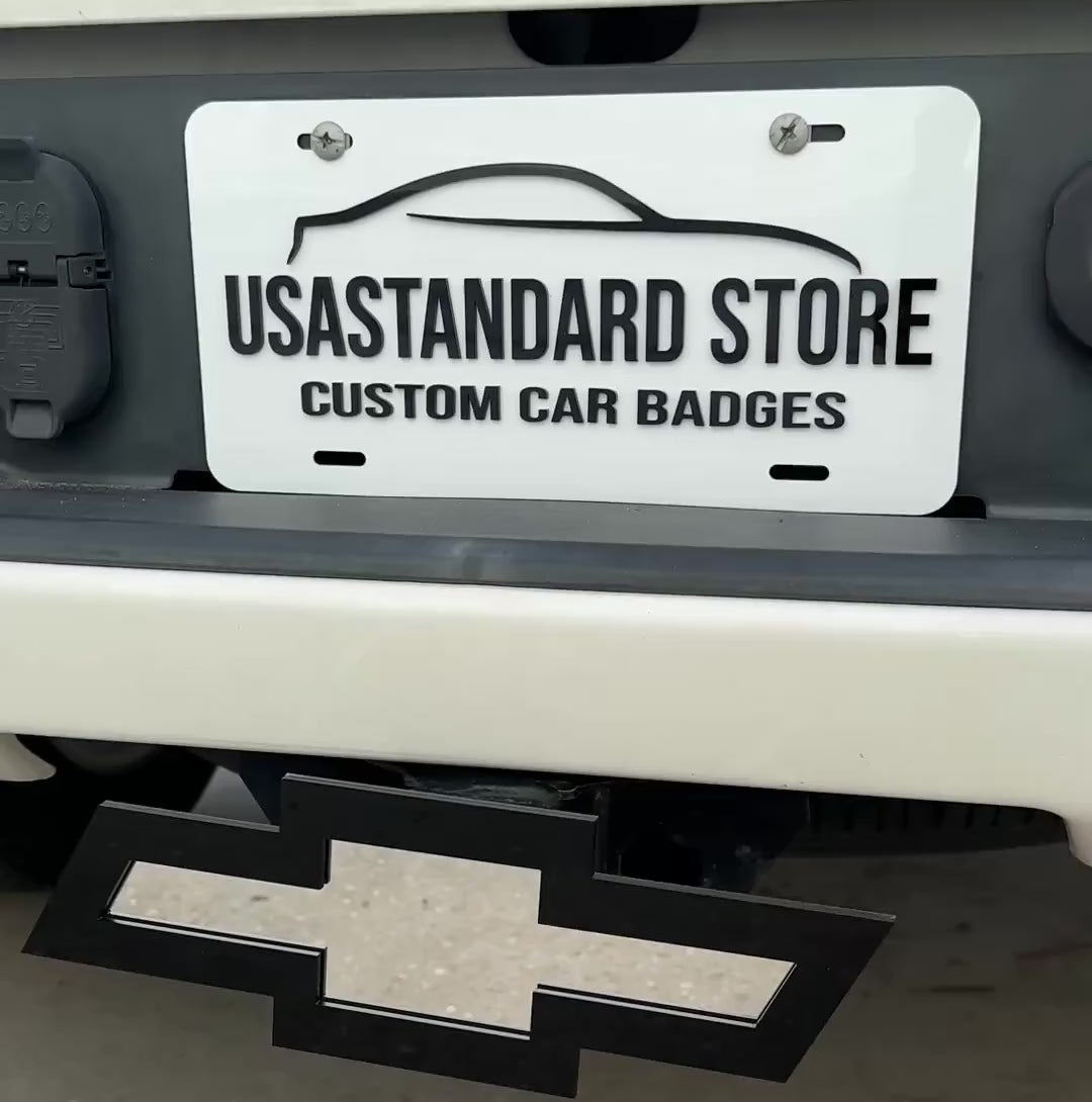 Chevrolet Bowtie hitch cover with mirror silver center and glossy black border