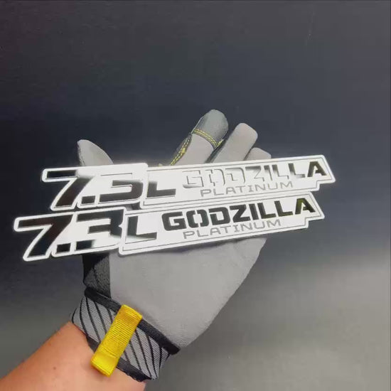 Truck exterior 7.3L Godzilla Platinum badge in silver black layered design