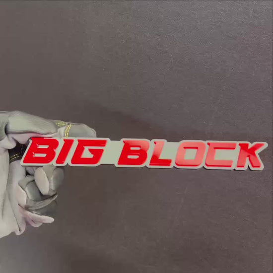 BIG BLOCK engine car badge with red lettering and silver background automotive emblem