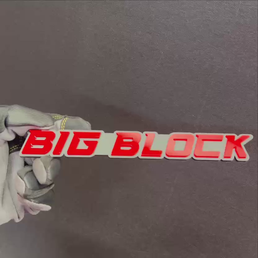 BIG BLOCK engine car badge with red lettering and silver background automotive emblem
