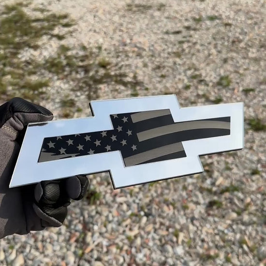 Chevrolet Bowtie emblem featuring an engraved American flag pattern
