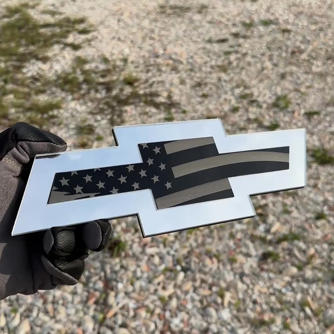Chevrolet Bowtie emblem featuring an engraved American flag pattern