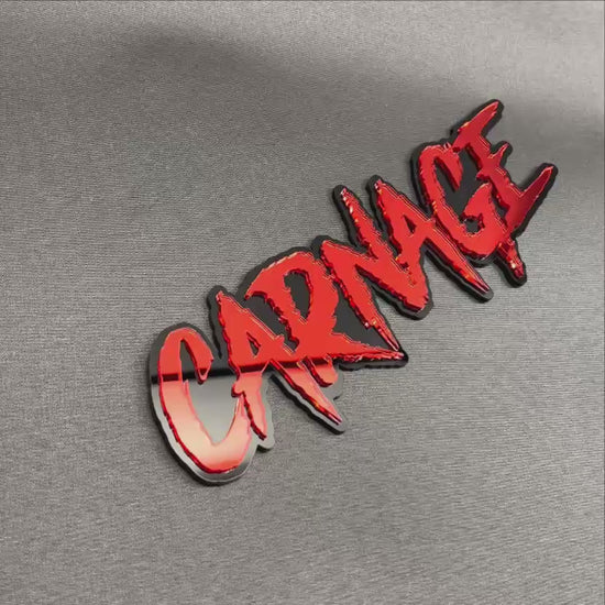 Red and black CARNAGE custom car emblem with aggressive text design