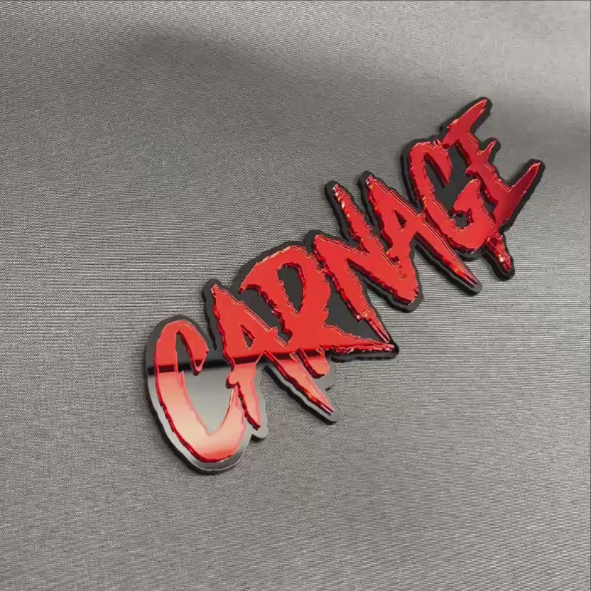 Red and black CARNAGE custom car emblem with aggressive text design
