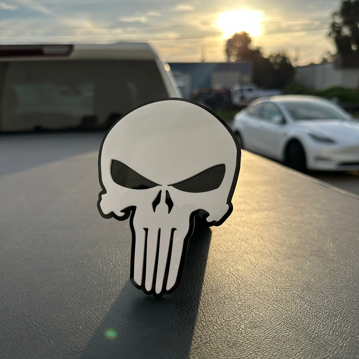 Punisher skull vehicle emblem in white with glossy black backing