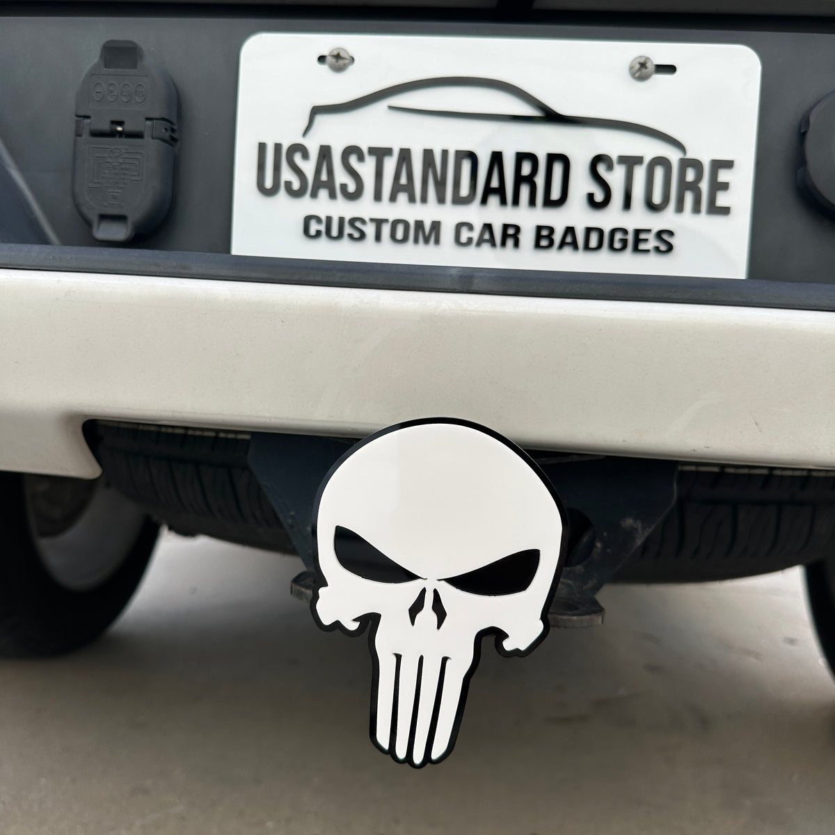 Black and white Punisher skull trailer hitch cover for vehicle styling