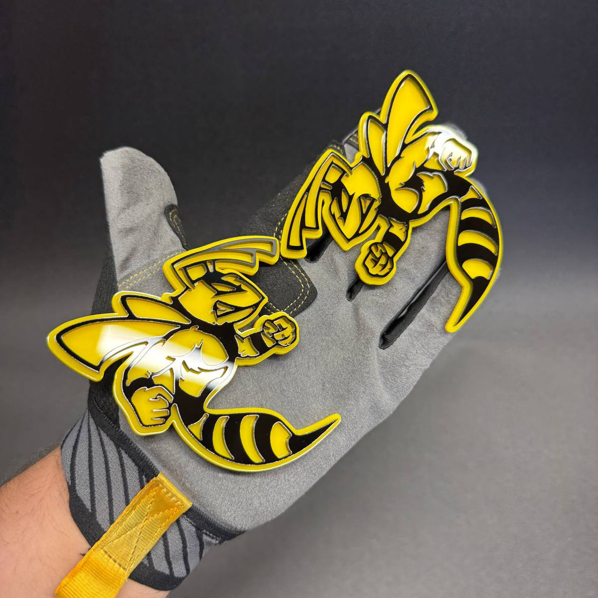 Custom angry bee automotive badge with detailed wings, bold outline and yellow black finish for Jeep Wrangler and Gladiator.