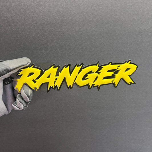 Yellow and black Ranger custom text car badge in graffiti style