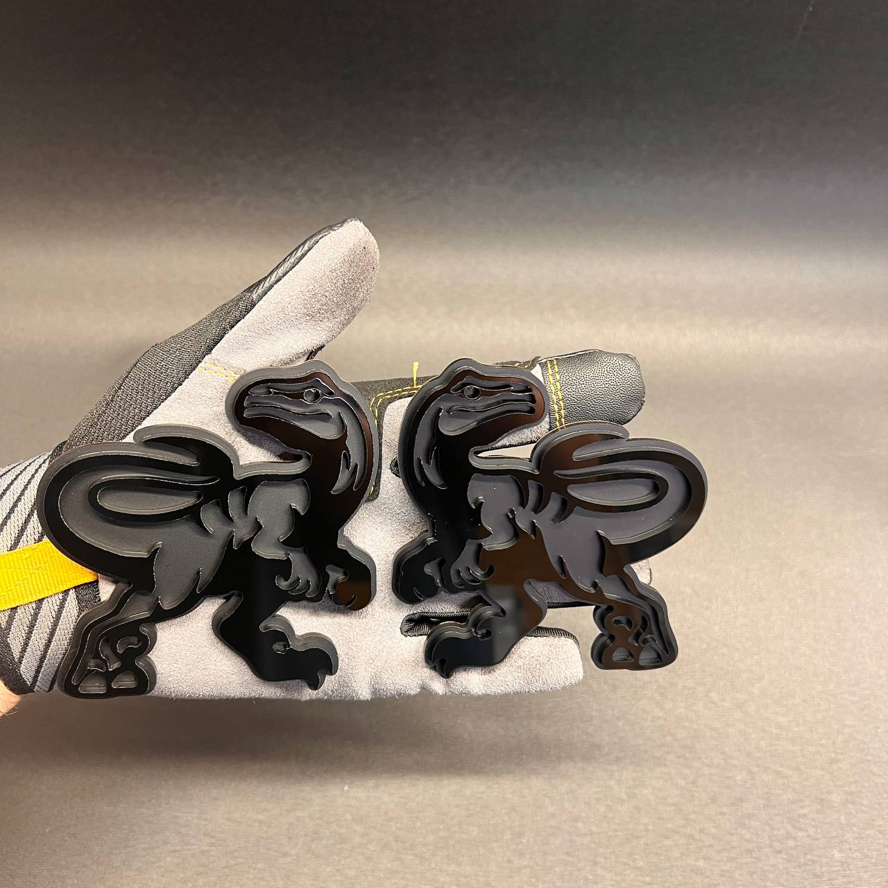 Raptor dinosaur car badge emblem in black and silver acrylic