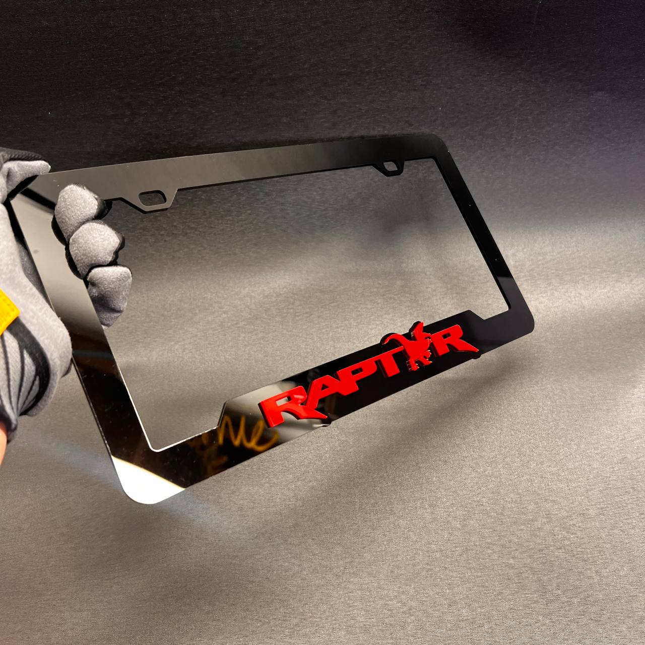 Exterior Raptor license plate holder for automotive front or rear plate