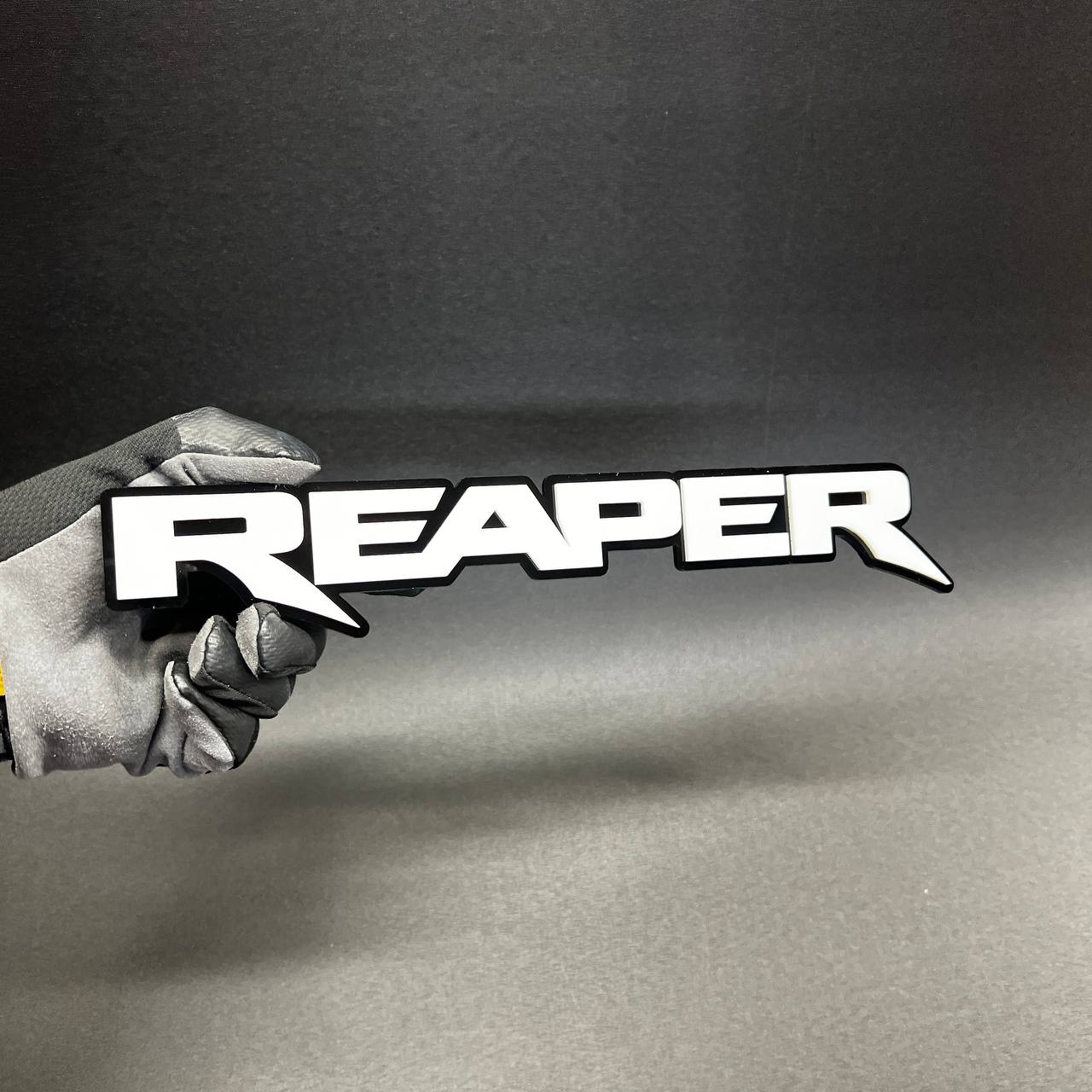 Reaper bold font automotive emblem for performance inspired truck modification