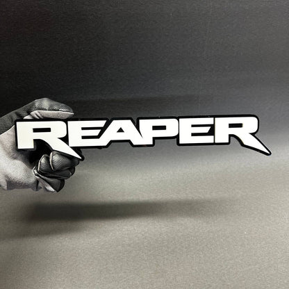 Reaper custom acrylic text badge with black outline for truck fender emblem styling