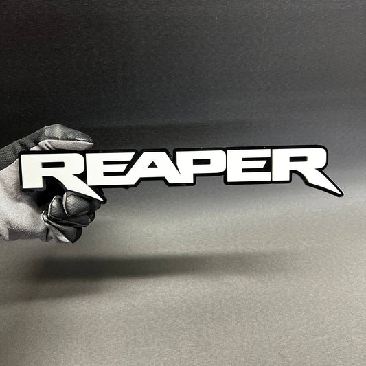 Reaper custom acrylic text badge with black outline for truck fender emblem styling
