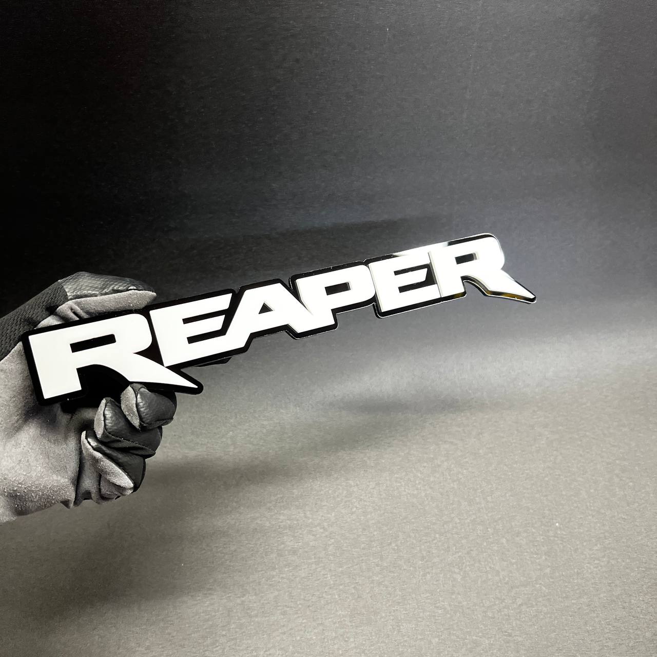 Reaper car badge with aggressive performance lettering for offroad truck styling