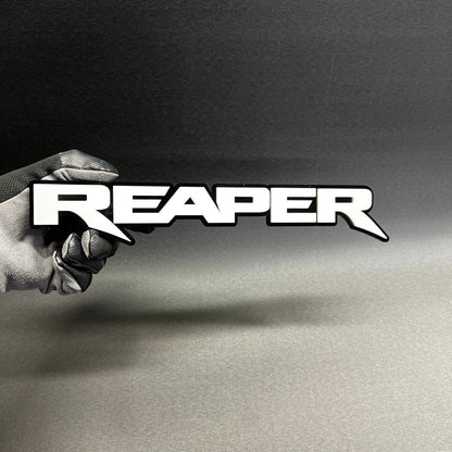 Custom Reaper text badge in bold racing font for muscle truck appearance