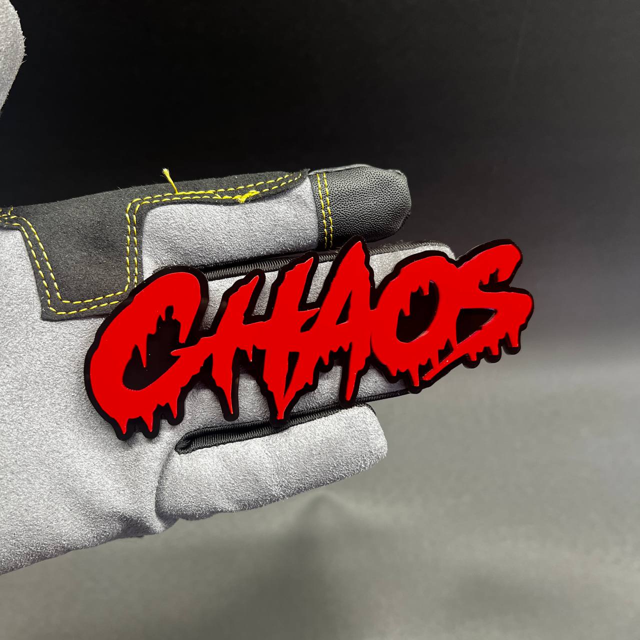 Red CHAOS custom text car badge fender emblem with black backing for Dodge Charger muscle styling.