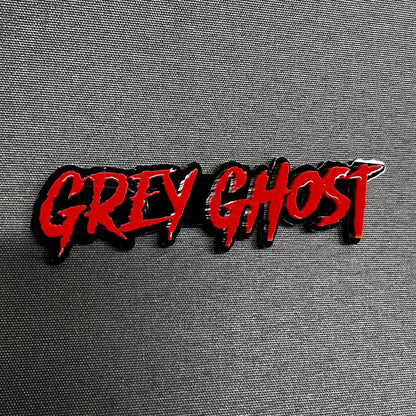 Custom Grey Ghost acrylic script badge with glossy red lettering and black outline for muscle truck hood or tailgate emblem upgrade