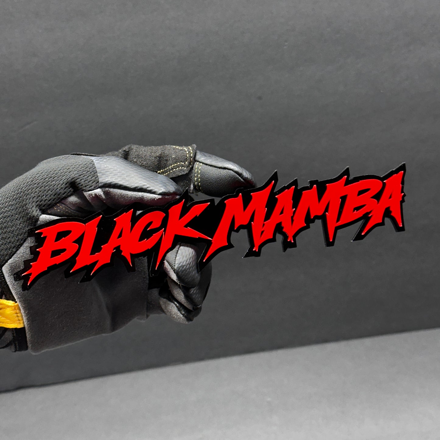 Aggressive Black Mamba text badge with red top layer and black base for Scat Pack style builds.