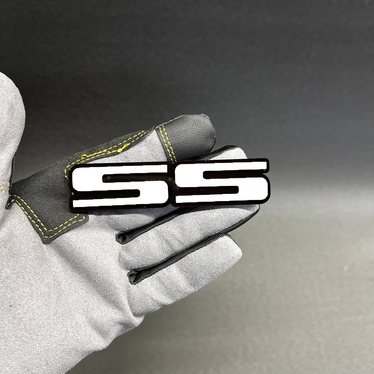 Handmade SS side badge with black base and red top layer for Chevy classic car restoration look.