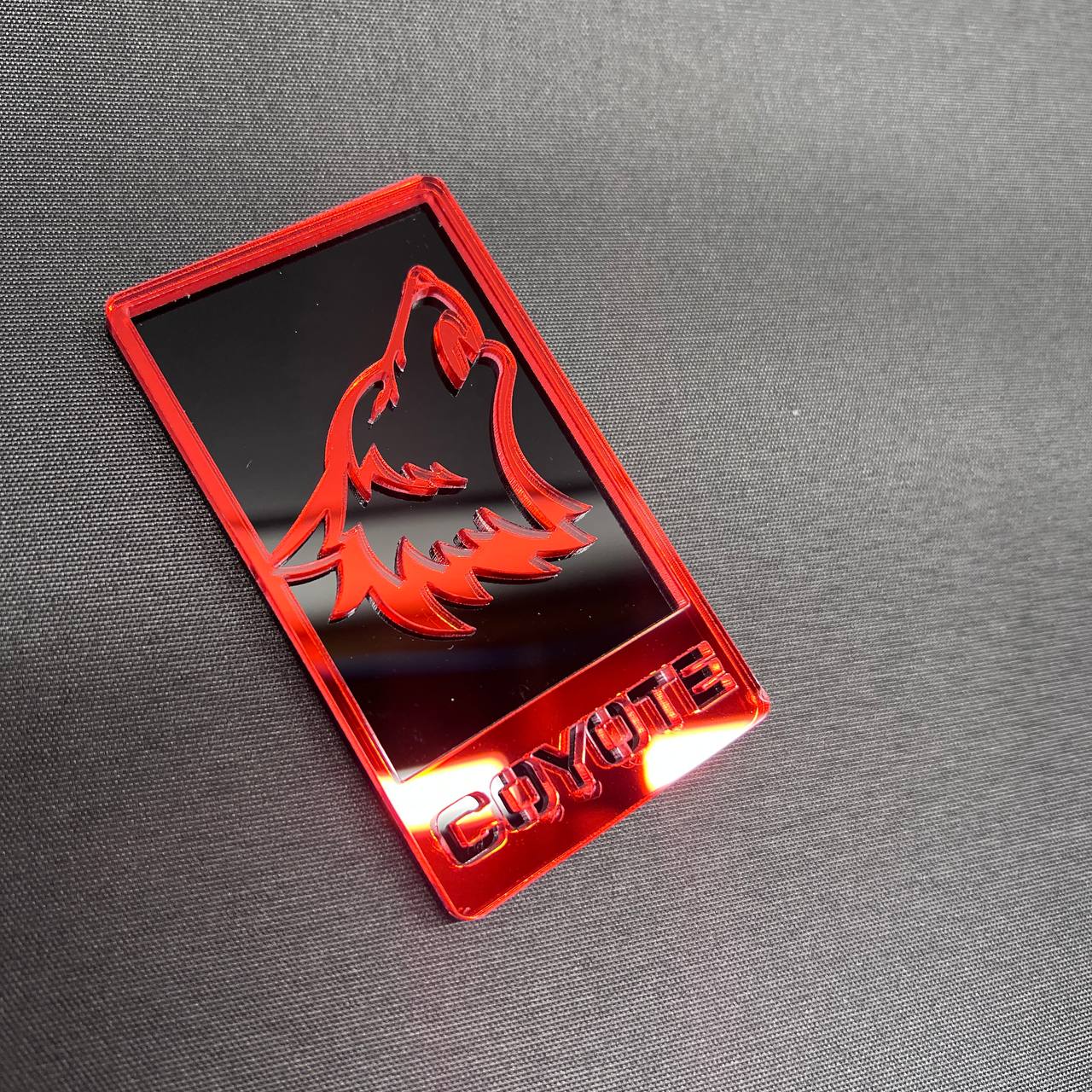 Black and red Coyote 5.0 emblem badge for custom vehicle grille