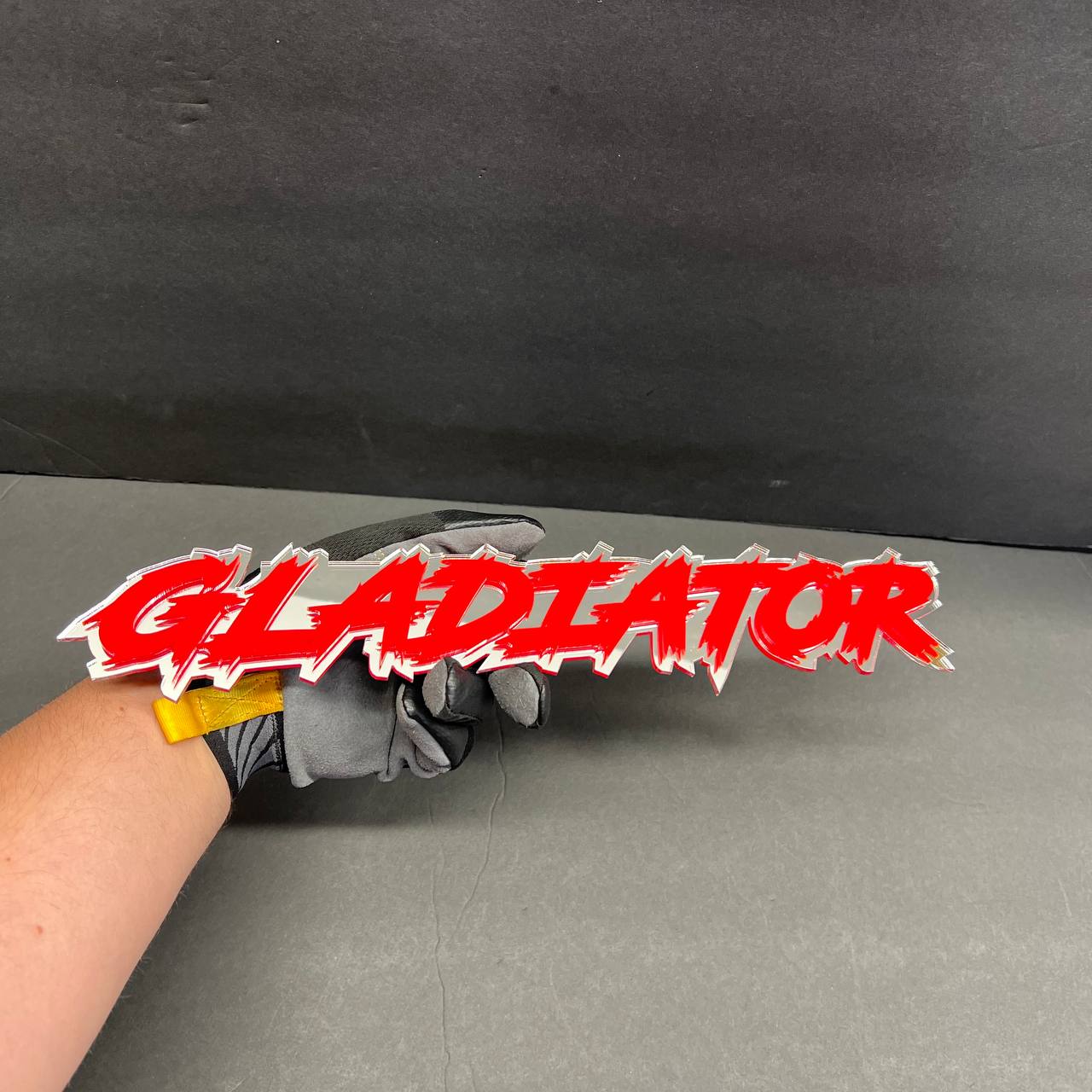 Custom GLADIATOR car badge fender emblem with aggressive offroad truck design.