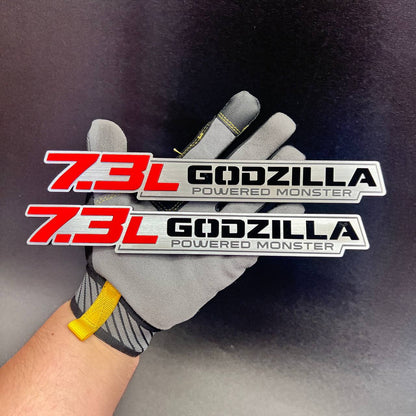 Red and silver 7.3L Godzilla Powered Monster truck badge set