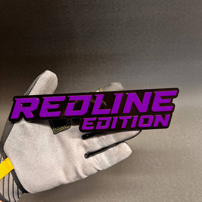 Custom Redline Edition automotive badge with raised red lettering