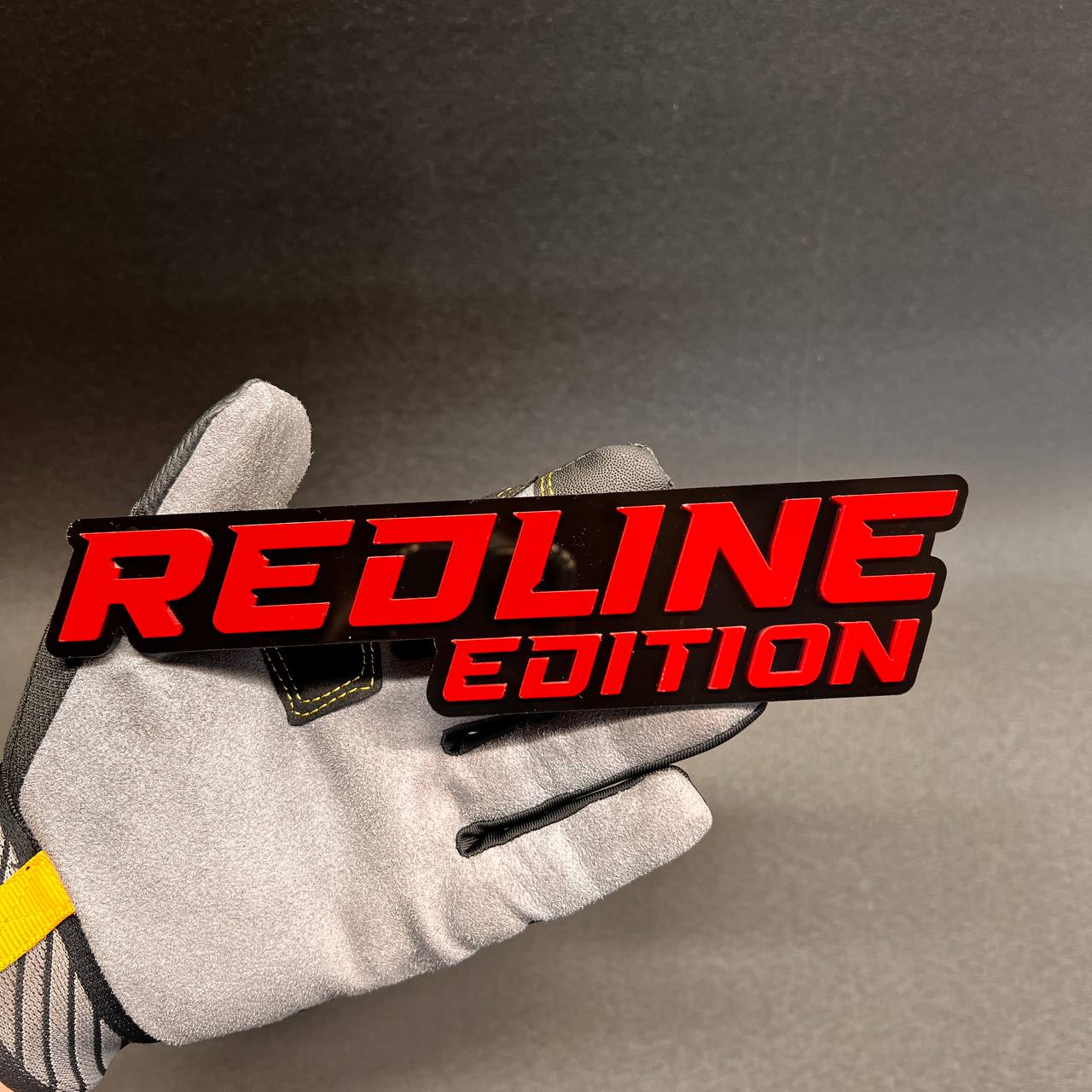 Redline Edition car badge fender emblem in red on black finish