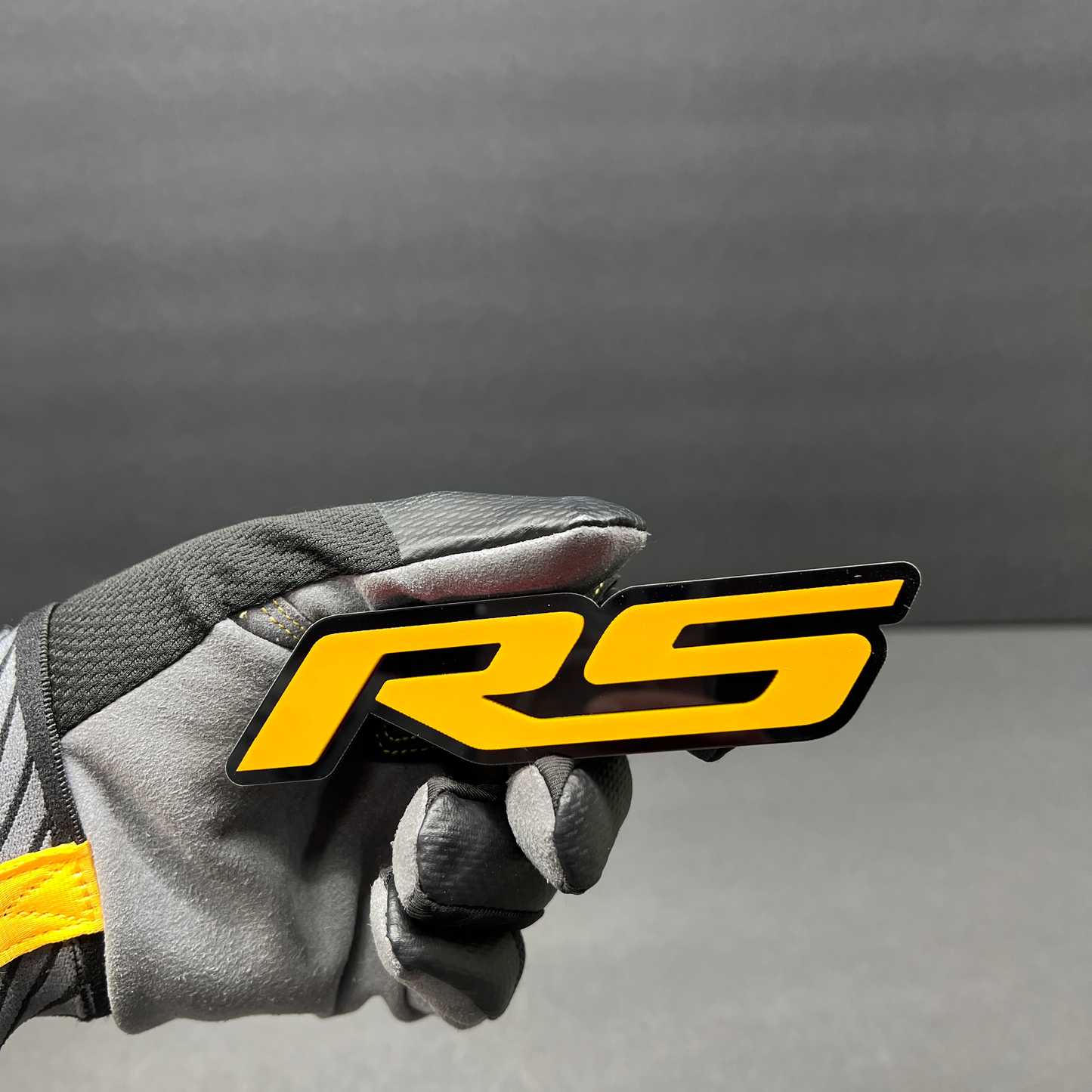 Custom RS emblem inspired by Audi RS4 sports sedan models.