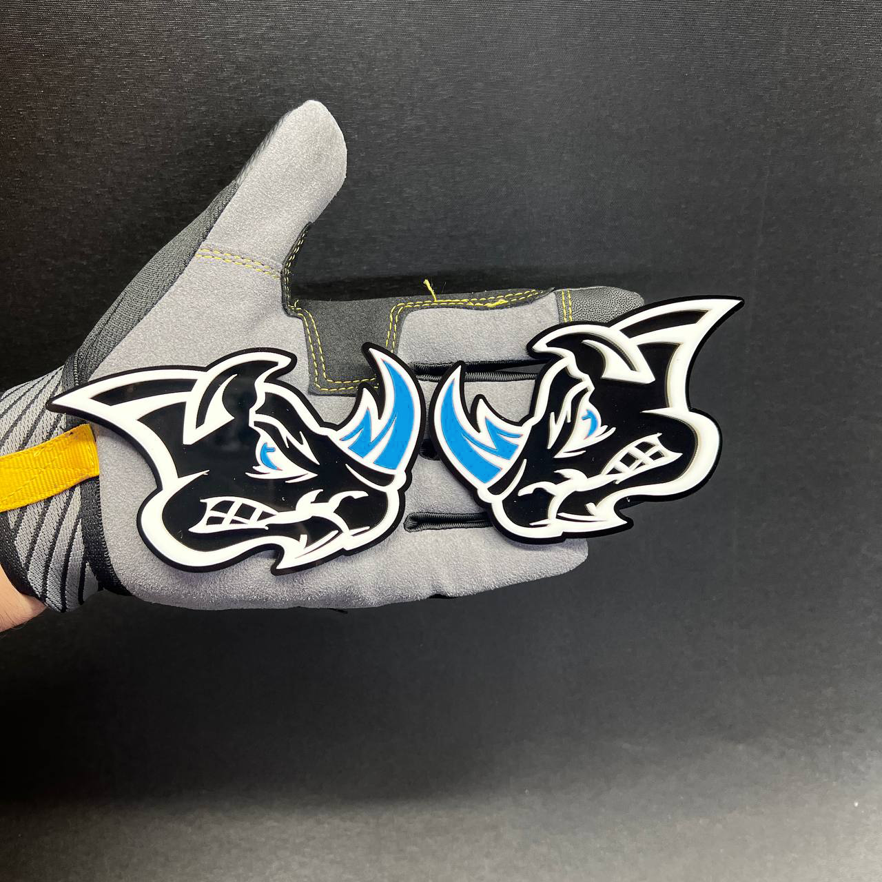 Black white and pink rhino car badge with bold performance look for Bronco, Raptor, Jeep, and truck builds.