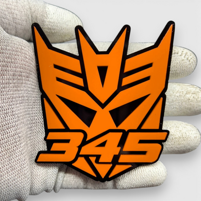 Decepticon style 345 auto badge with aggressive robot design