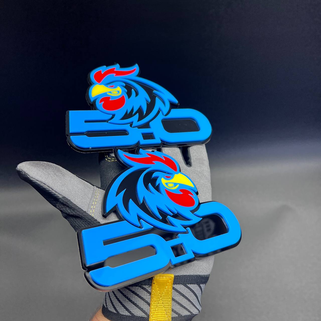 Blue Rooster 5.0 automotive emblem for grille, fender, or tailgate installation.