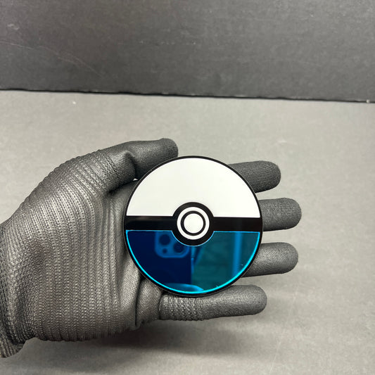 Blue monster ball inspired car badge fender emblem with white and black details