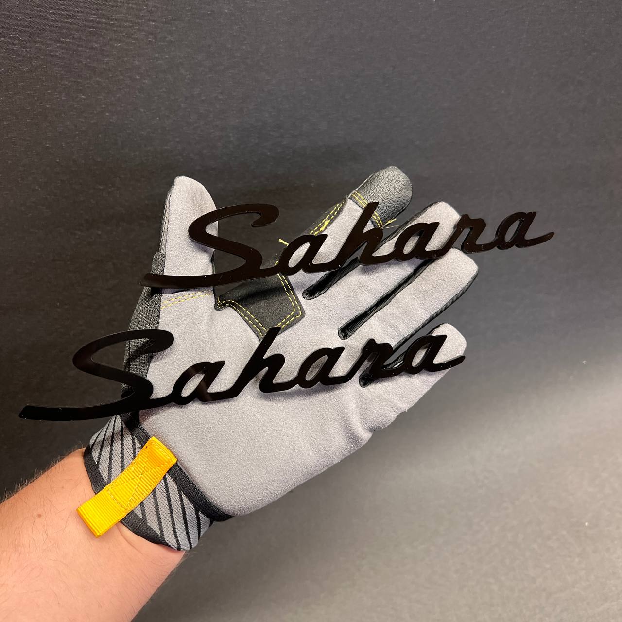 Sahara text automotive badge designed for fender, door, or tailgate placement