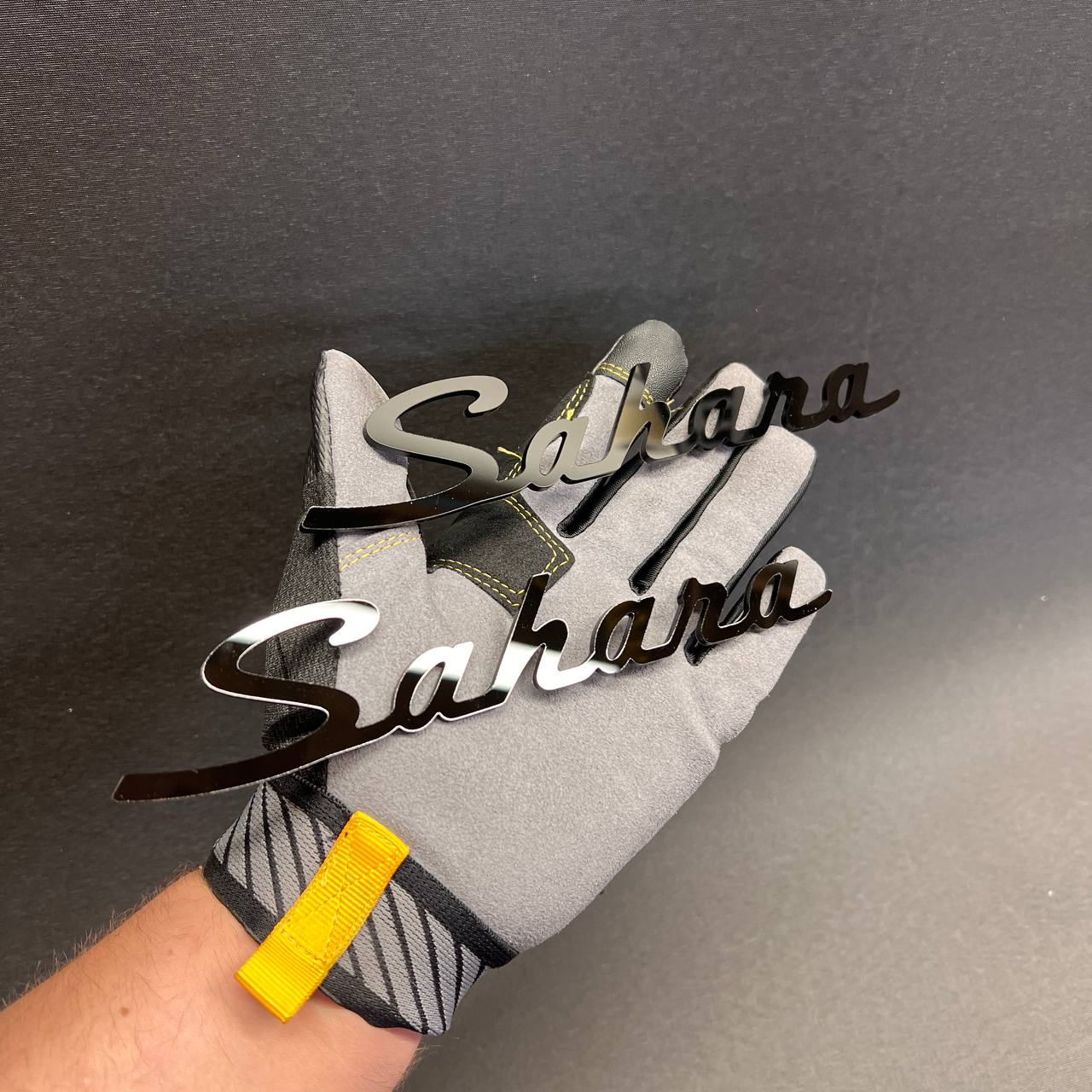 Sahara script car badge with glossy black finish for truck or SUV exterior