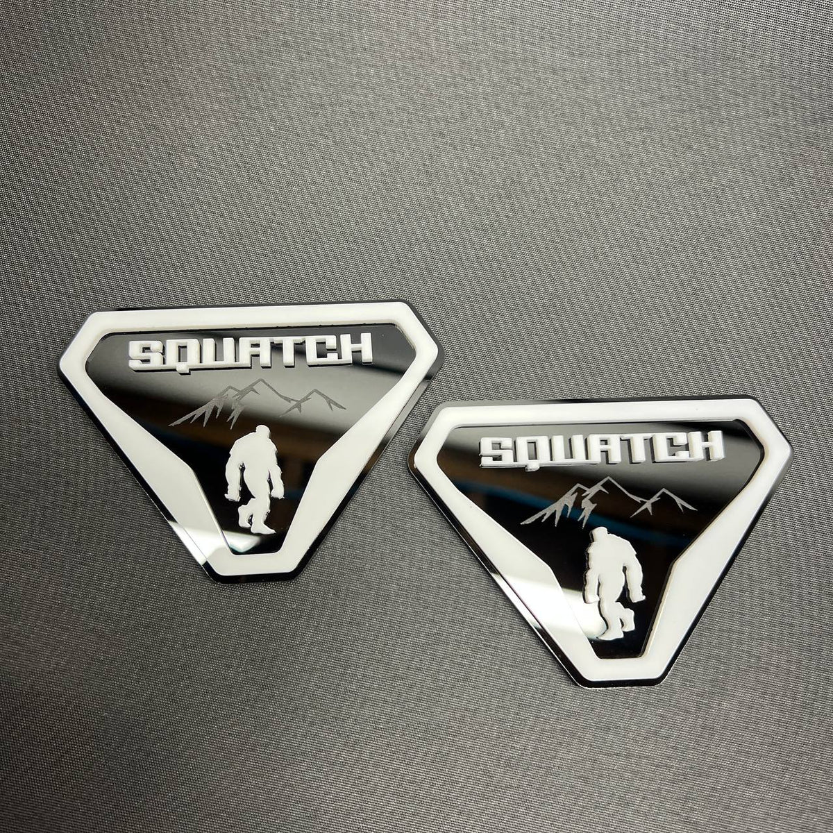 Sasquatch mountain car badge emblem in white and black