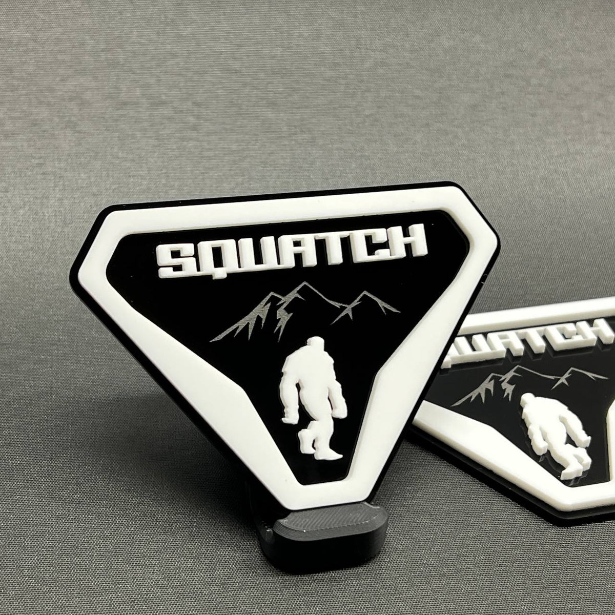 Sasquatch white and black fender emblem with mountain graphic