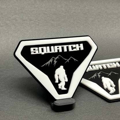 Sasquatch white and black fender emblem with mountain graphic