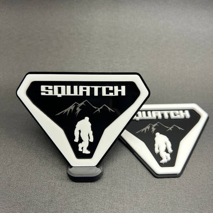 Sasquatch white on black car badge emblem with mountain design