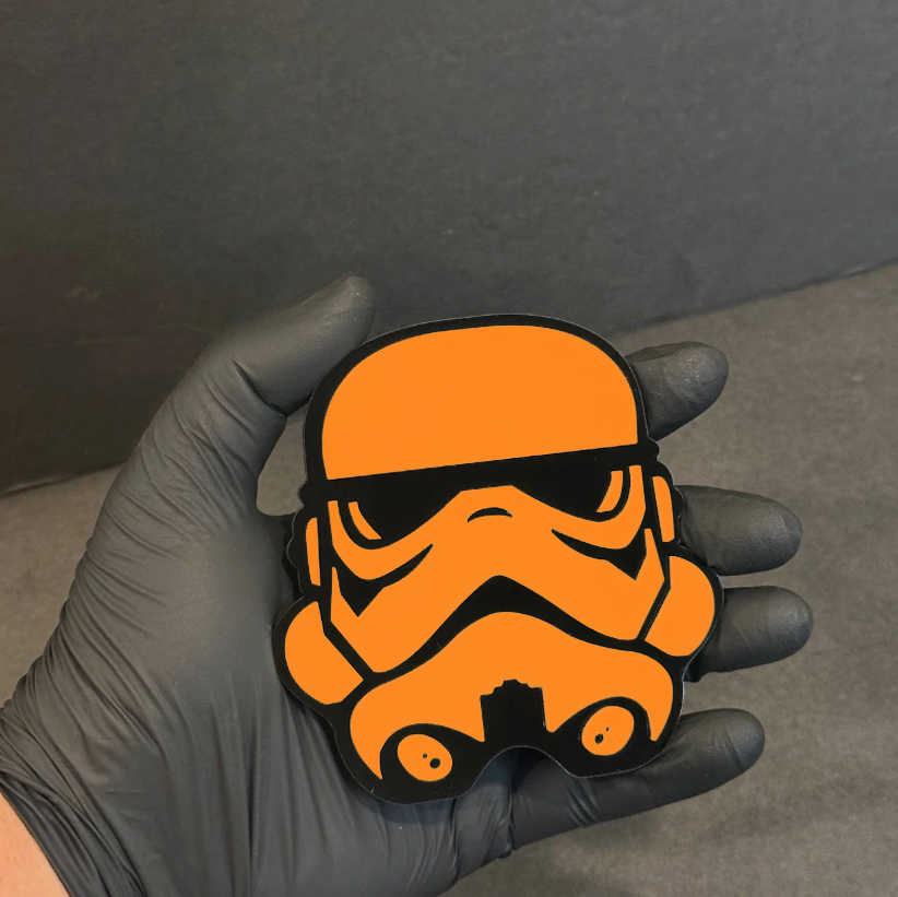 sci fi helmet emblem on RAM 1500 truck exterior styling