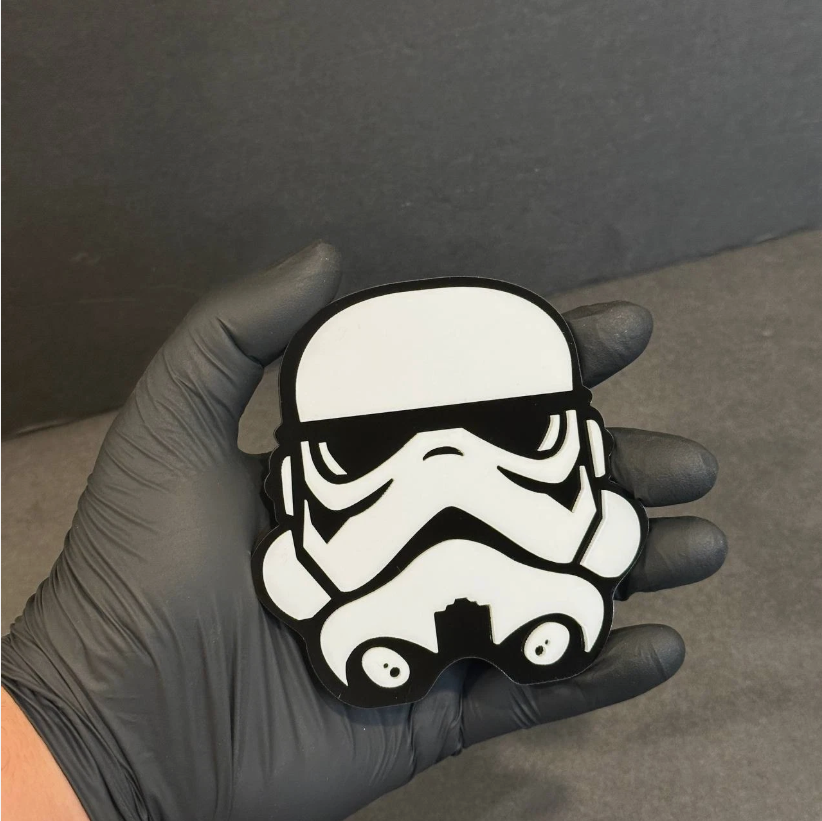 tailgate helmet badge on lifted truck offroad build